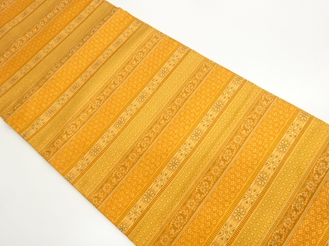 横縞に抽象草花・亀甲・菱模様織出し開き名古屋帯（額縁仕立て）